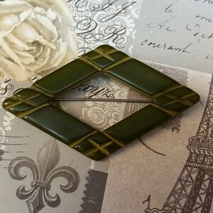 Carved old vintage Bakelite pin 2”